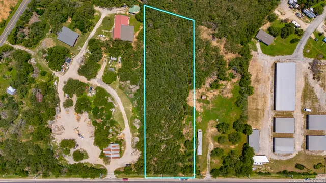 view of a multi story building with yard