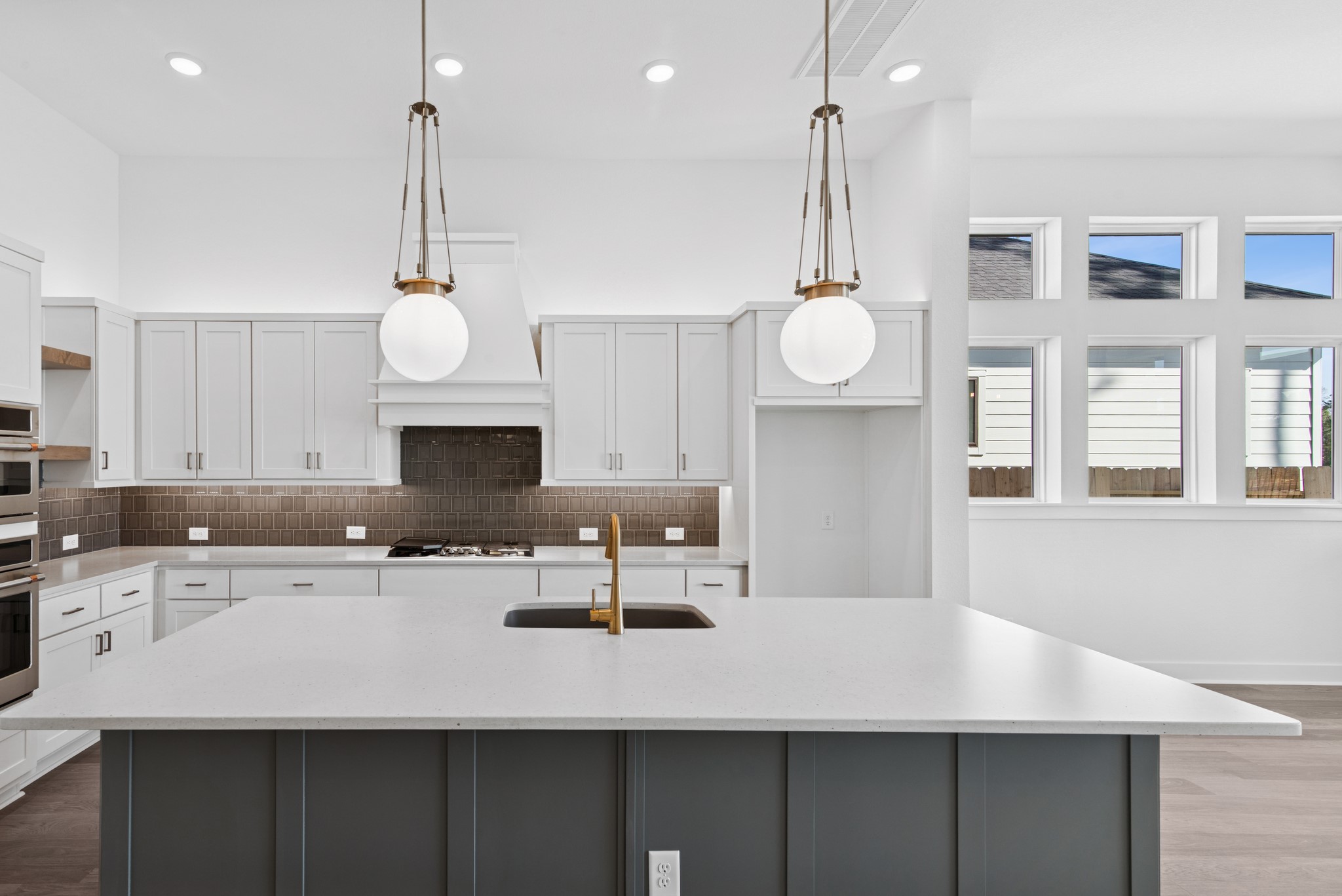 16138 Rita Road Conroe, TX 77302 - Photo 26 of 50 a kitchen with a counter space cabinets and appliances