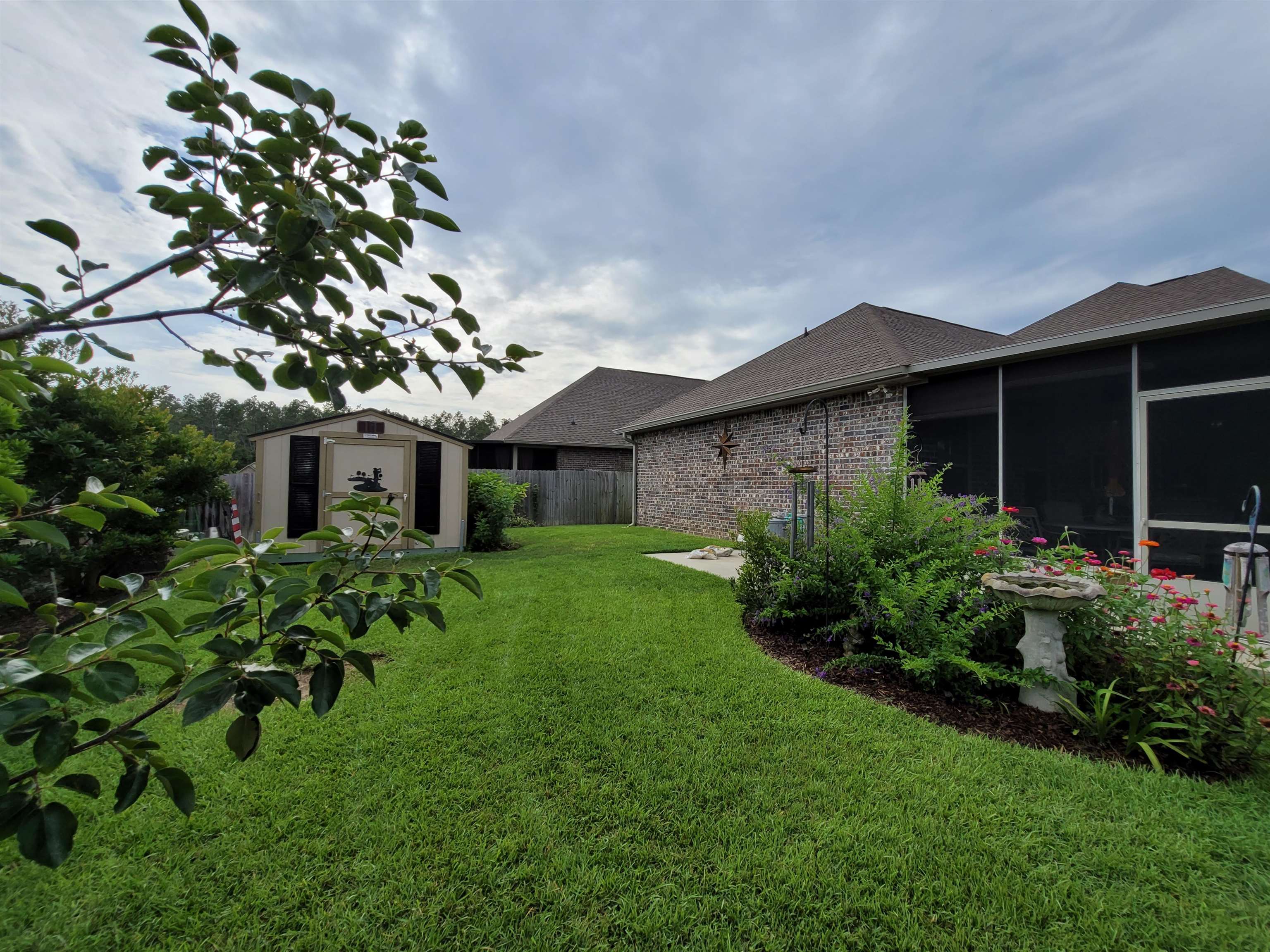 1161 Crown Walk Drive Foley, AL 36535 - Photo 15 of 49 Back Yard & Screened Porc