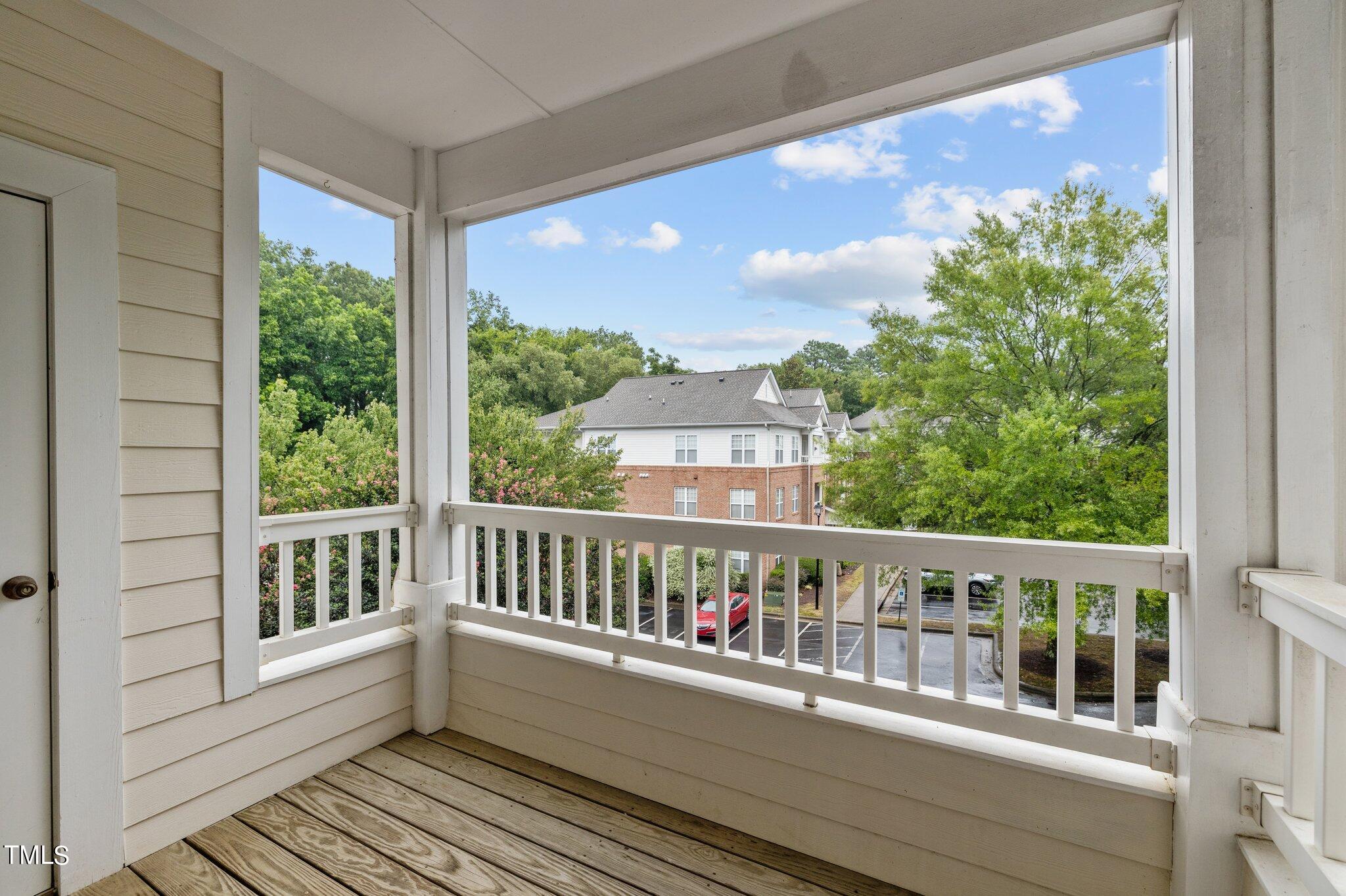 1710 Tiffany Bay Court, Unit 301 Raleigh, NC 27609 - Photo 26 of 36 a view of a two chairs in the balcony