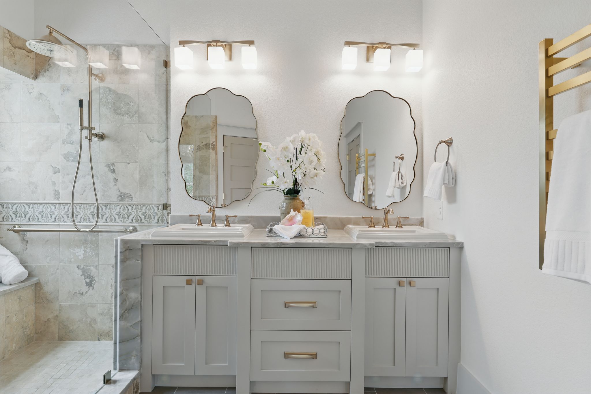 6905 Rudi Cove Austin, TX 78759 - Photo 24 of 37 Marble countertops and dual sinks elevate this primary bathroom's elegance.