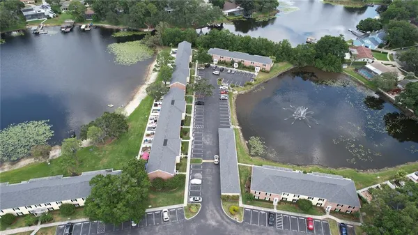 a backyard of a house with yard and outdoor seating