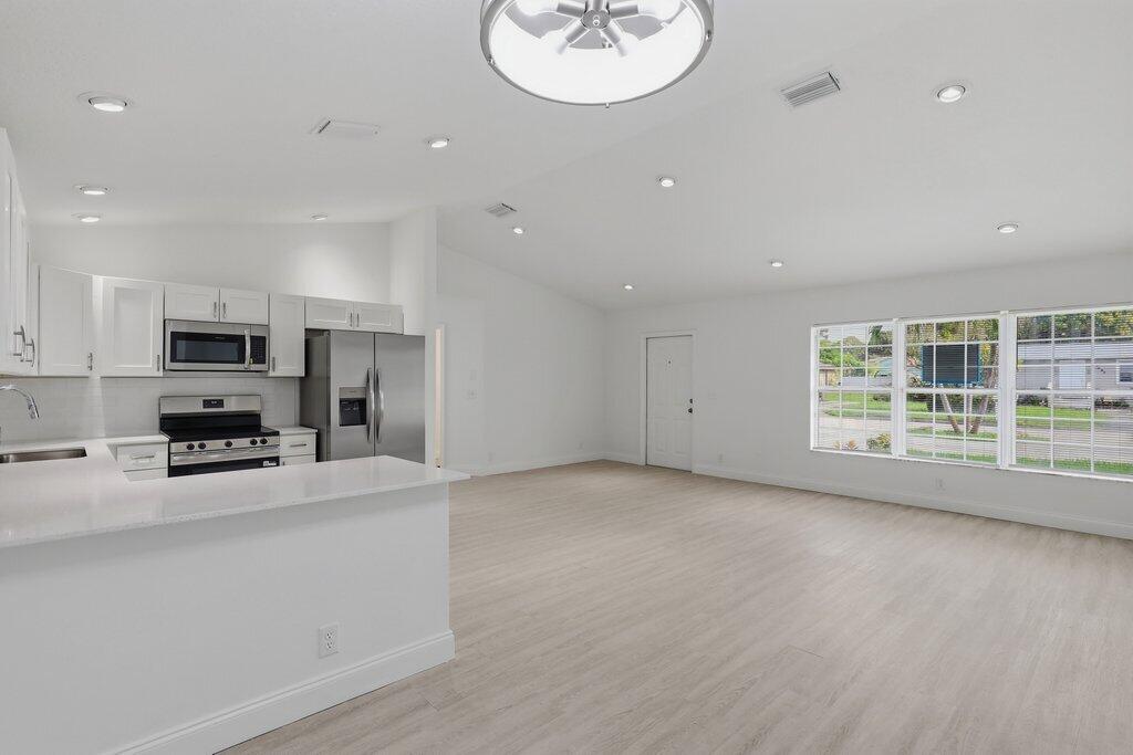 6900 2nd Street Jupiter, FL 33458 - Photo 2 of 24 Dining to Foyer.jpeg-SMALL