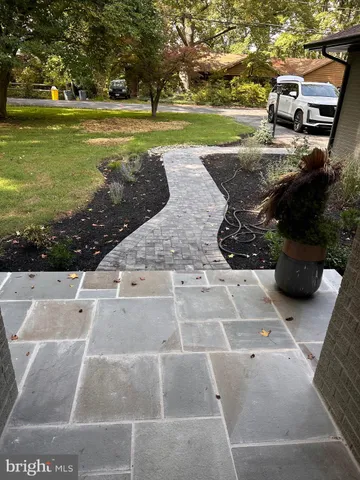 a view of a yard with an outdoor space