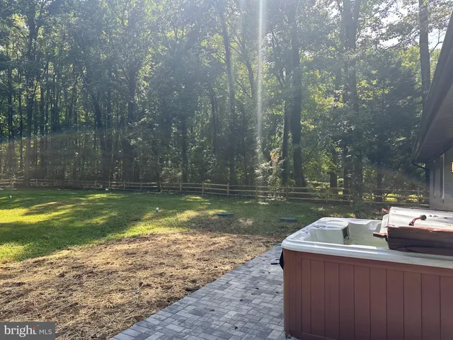 a view of a yard with a slide