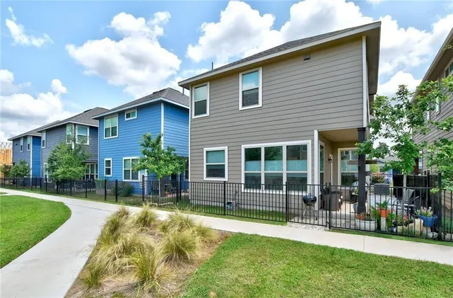 a house view with a garden space