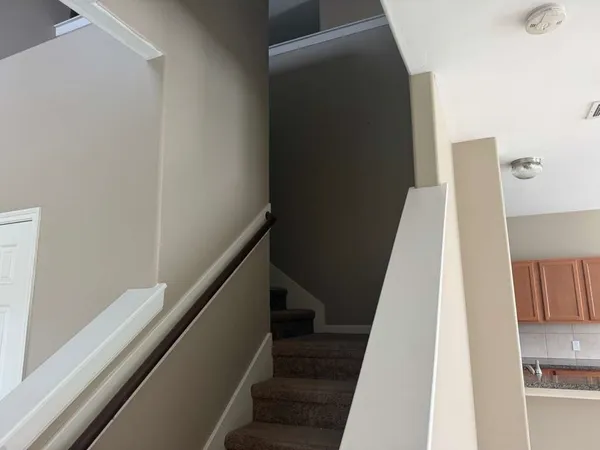 a view of entryway with wooden floor