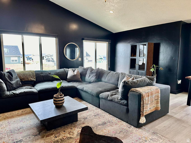 4349 Half Mile Road East Enoch, UT 84721 - Photo 7 of 36 Living area with light wood-style floors