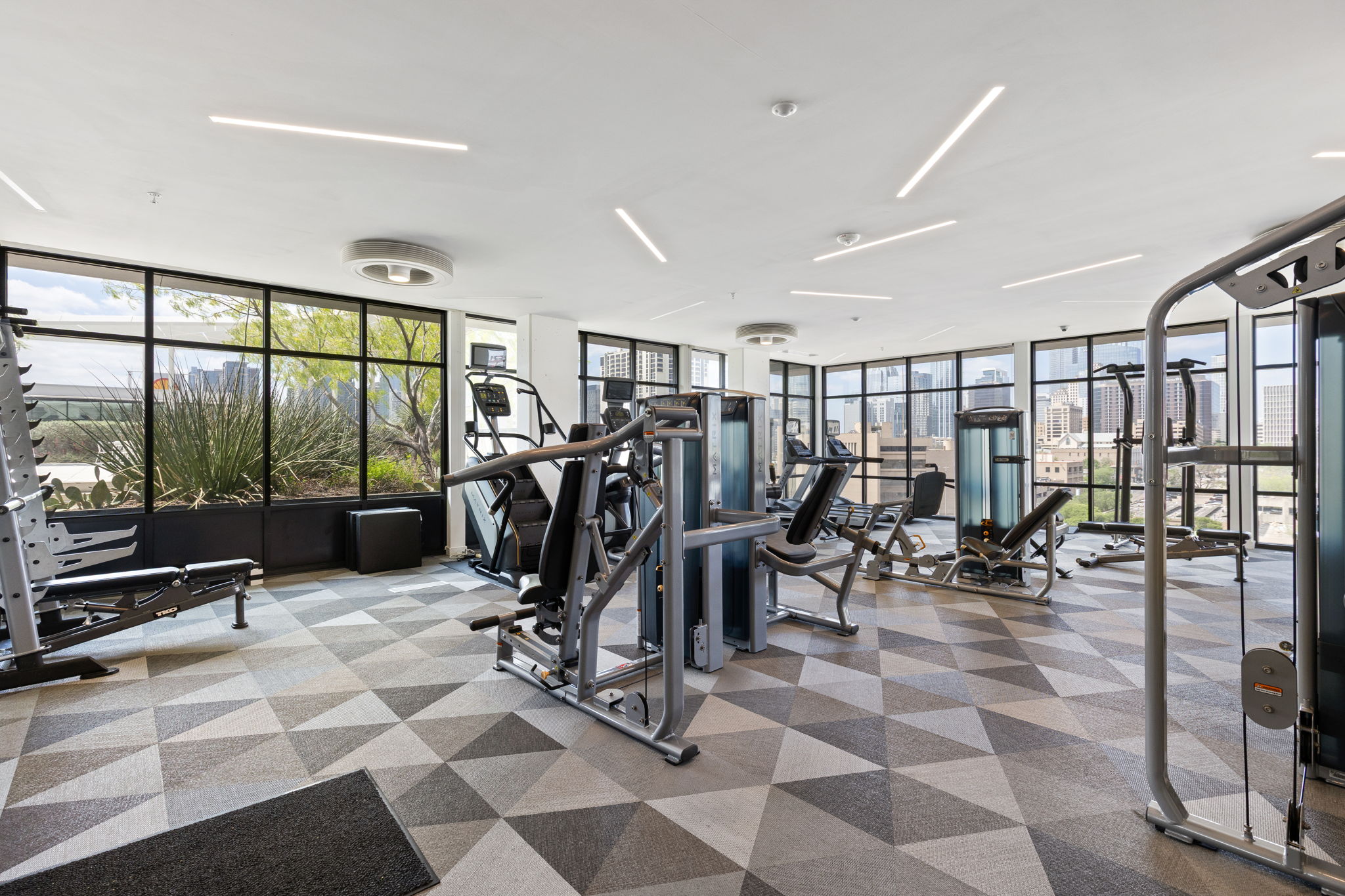 800 Embassy Drive, Unit 113 Austin, TX 78702 - Photo 26 of 36 a view of a room with gym equipment