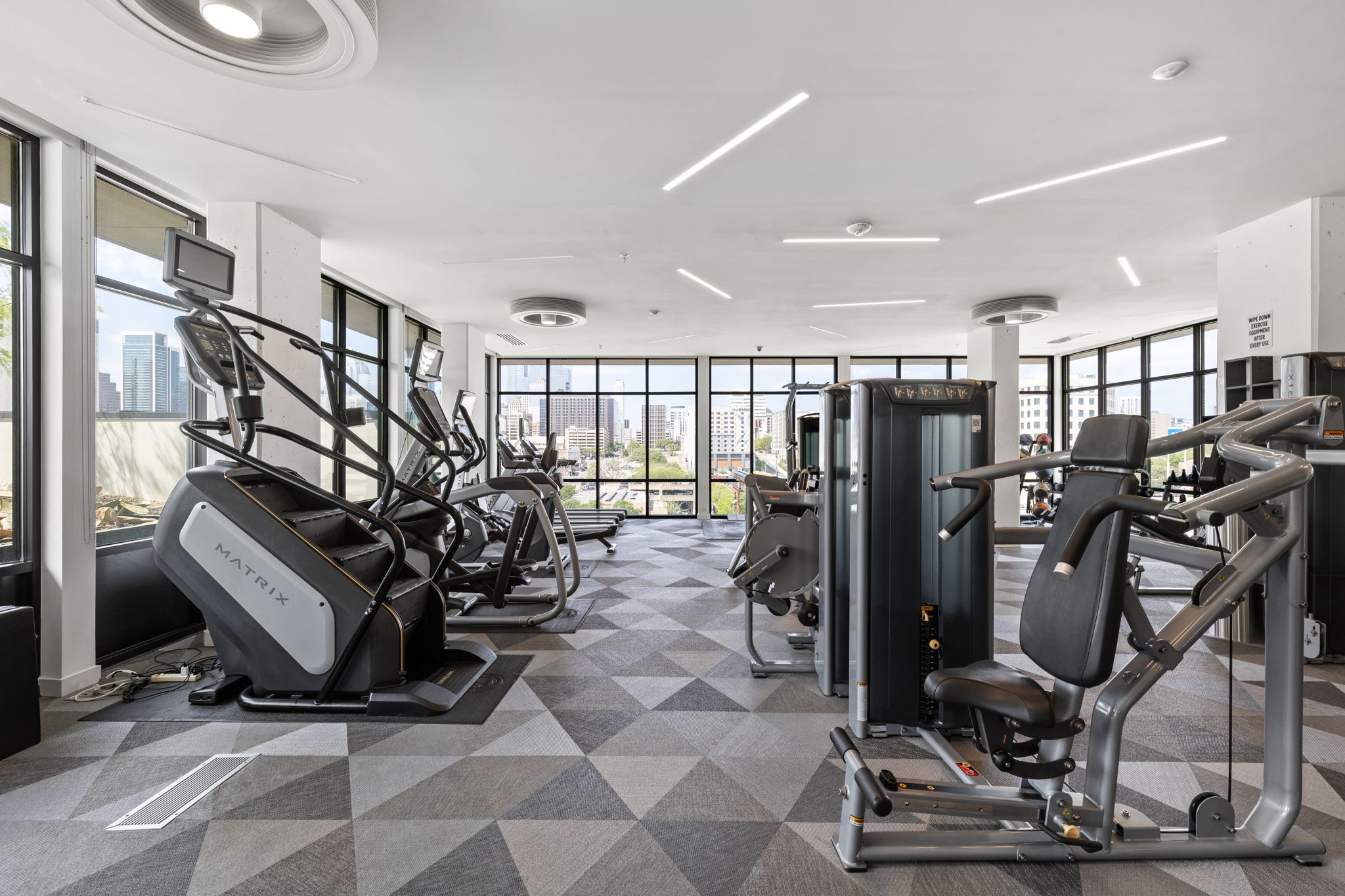 800 Embassy Drive, Unit 113 Austin, TX 78702 - Photo 27 of 36 a view of a room with gym equipment