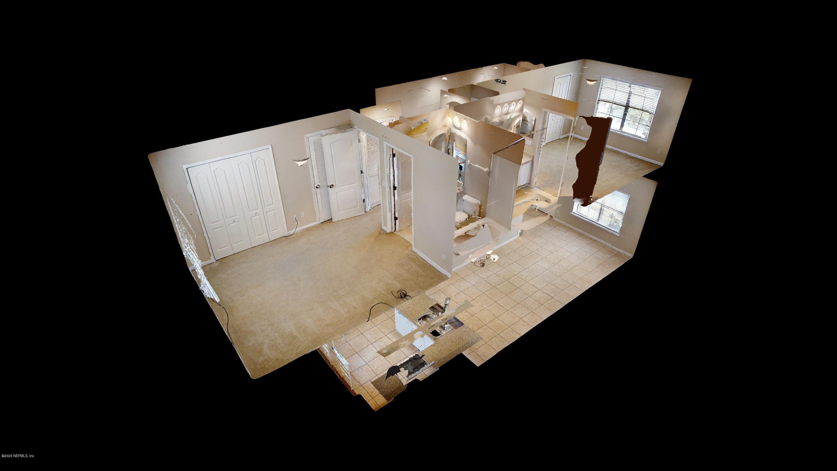 486 Cabernet Place St. Augustine, FL 32084 - Photo 18 of 29 a white bath tub sitting in a bathroom