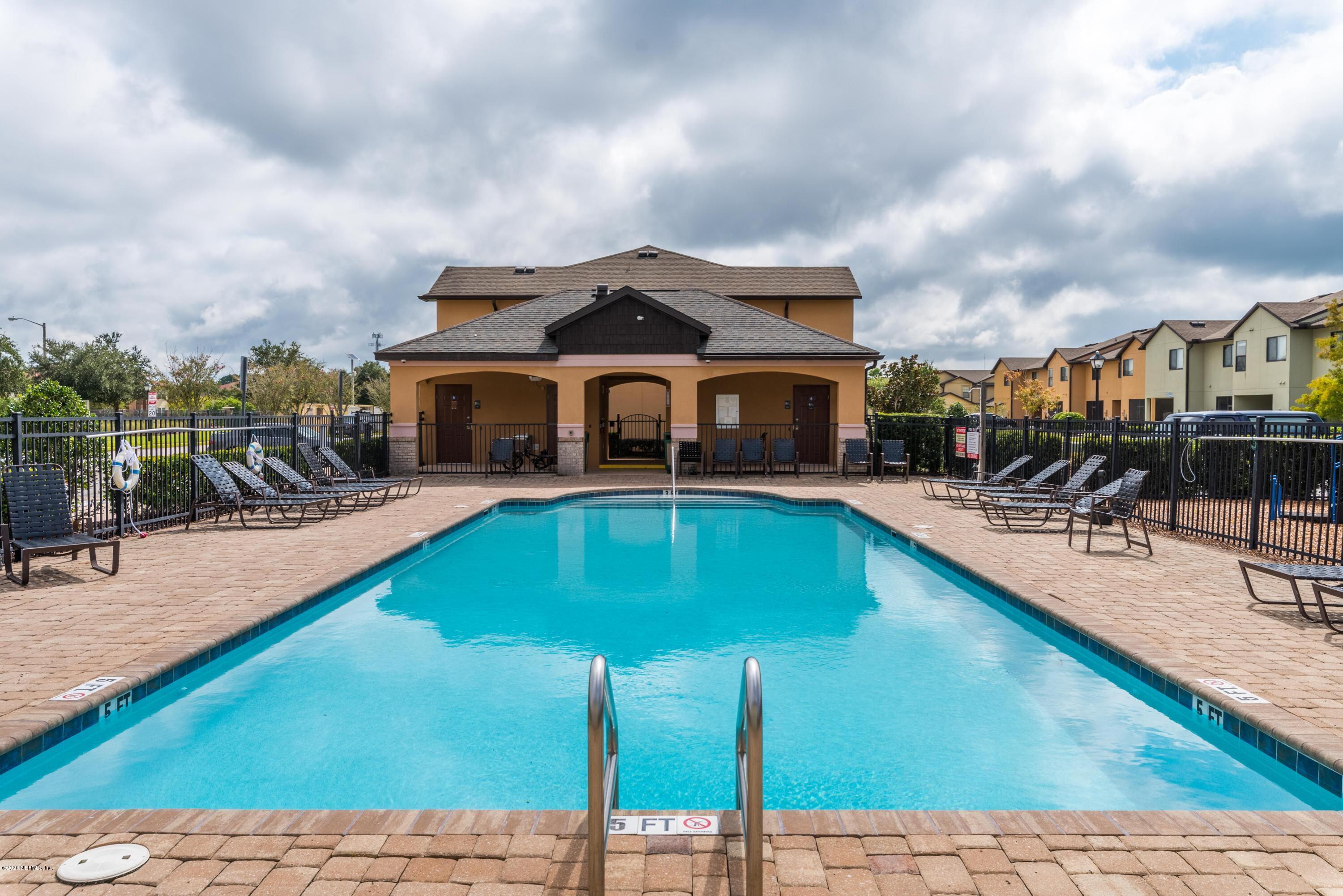 486 Cabernet Place St. Augustine, FL 32084 - Photo 22 of 29 a swimming pool with outdoor seating yard and balcony