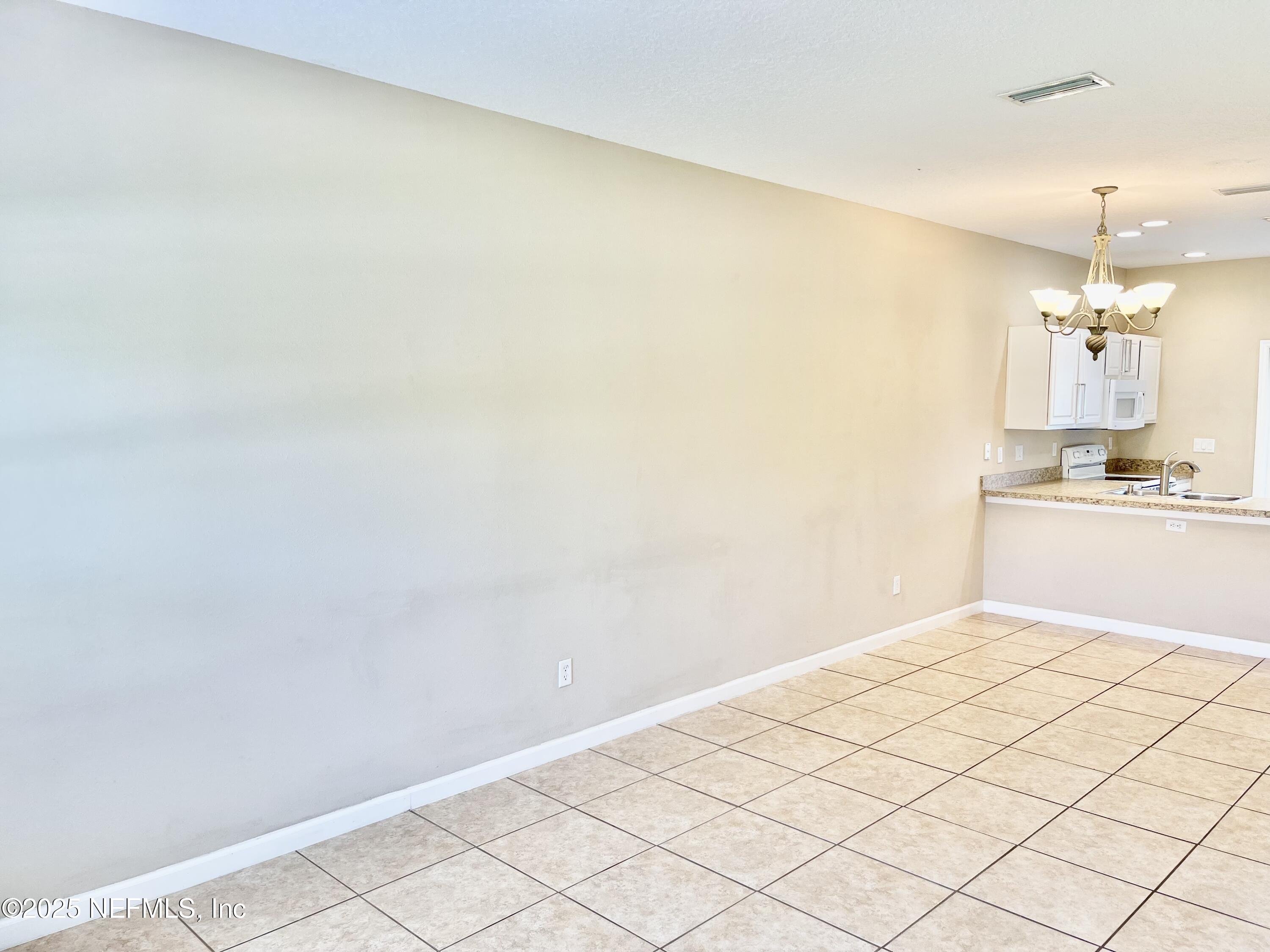 486 Cabernet Place St. Augustine, FL 32084 - Photo 10 of 29 a bathroom with a sink and a mirror