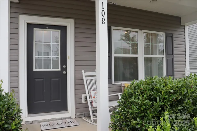a view of entrance door of a house
