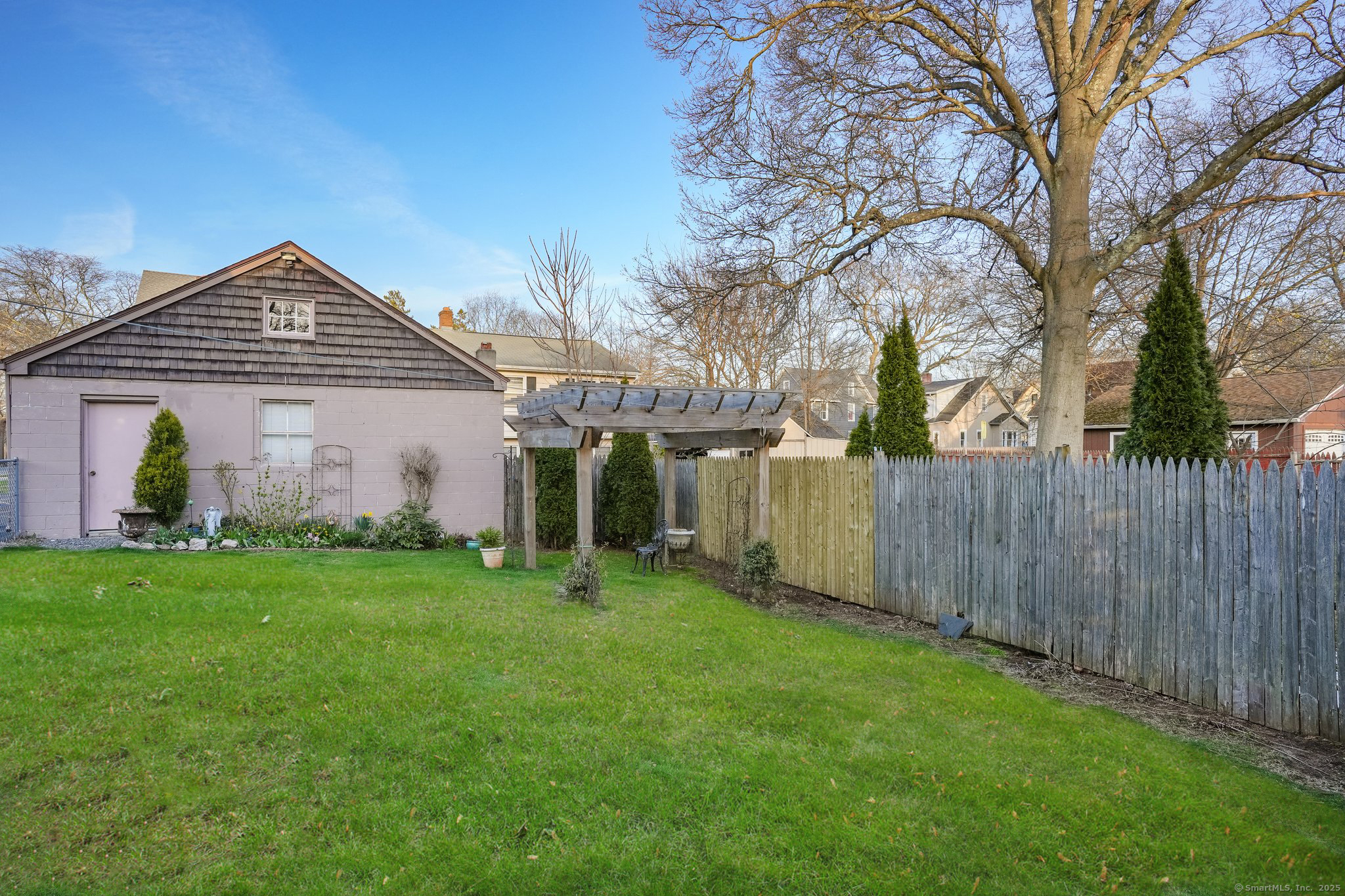 257 Concord Street New Haven, CT 06512 - Photo 3 of 25 Private yard with NEWER Pergola! Two car garage, Deck!