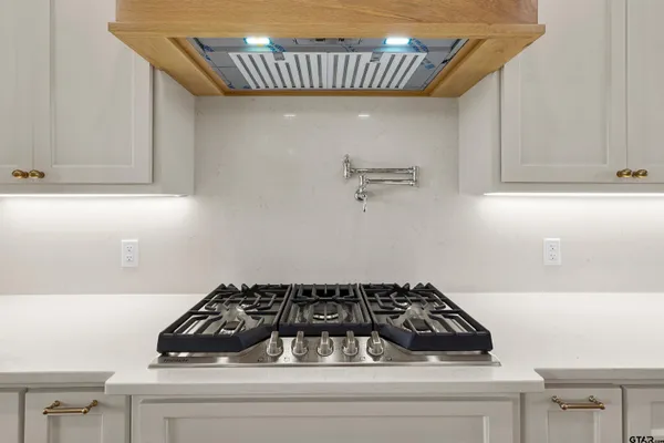a bathroom with a double vanity sink mirror and double