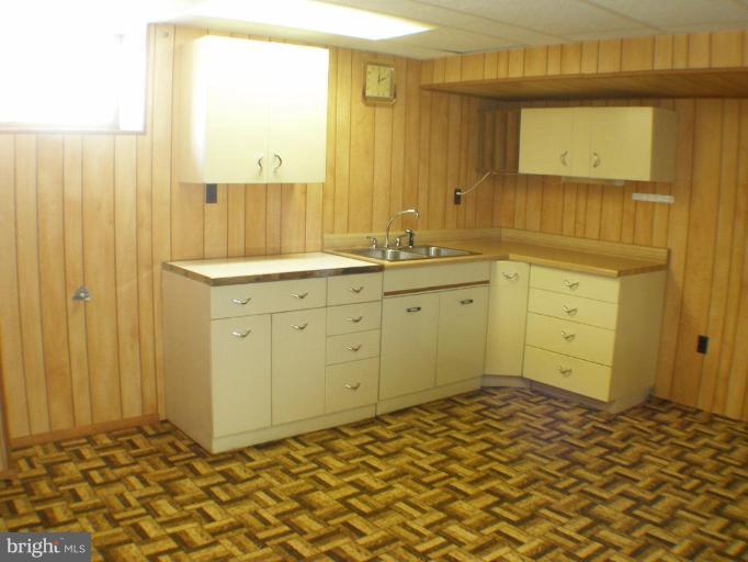 7214 Dooman Road Windsor Mill, MD 21244 - Photo 2 of 22 Lower Level possibility of in-law suite