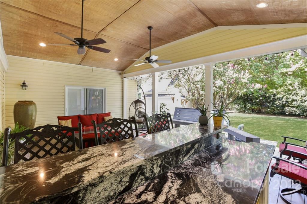 1023 Sedgefield Road Charlotte, NC 28209 - Photo 16 of 40 a living room with patio furniture