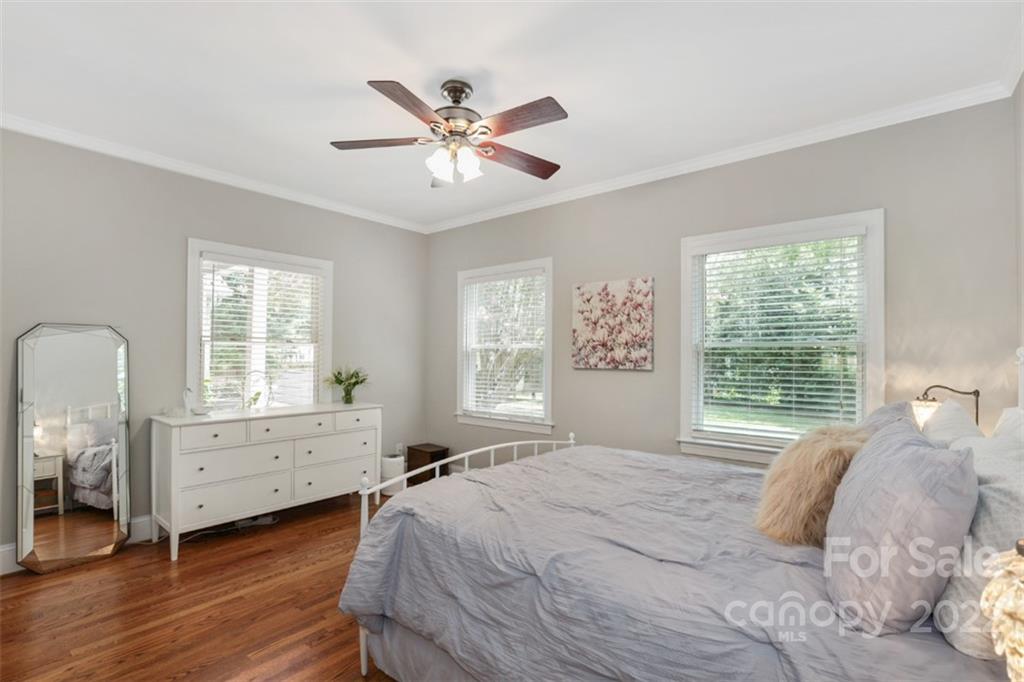 1023 Sedgefield Road Charlotte, NC 28209 - Photo 23 of 40 a bedroom with a bed and a window
