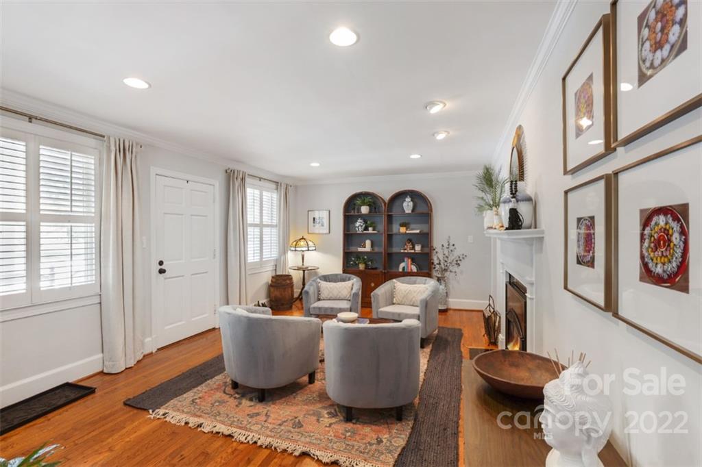 1023 Sedgefield Road Charlotte, NC 28209 - Photo 6 of 40 a living room with patio and a couch