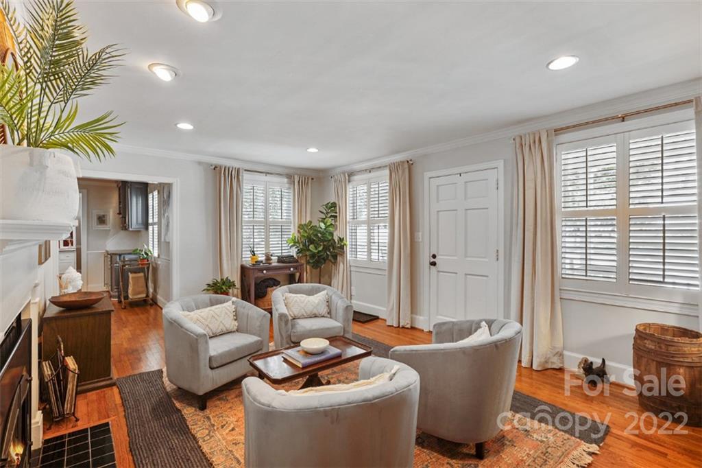 1023 Sedgefield Road Charlotte, NC 28209 - Photo 7 of 40 a living room with furniture and a window