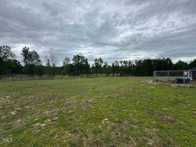 0 Beasley Road Benson, NC 27504 - Photo 2 of 40 a view of a green field with wooden fence