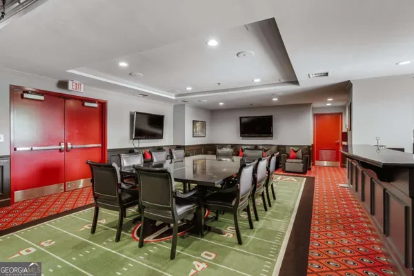 a view of a dining room with furniture