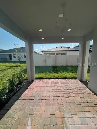 a view of storage and utility room with empty racks