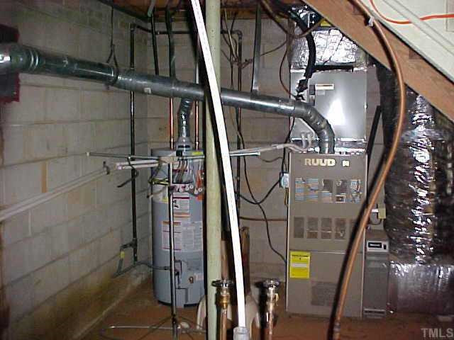 7021 Holly Springs Road Raleigh, NC 27606 - Photo 9 of 10 Updated Furnace ,duct work and water heater. Other