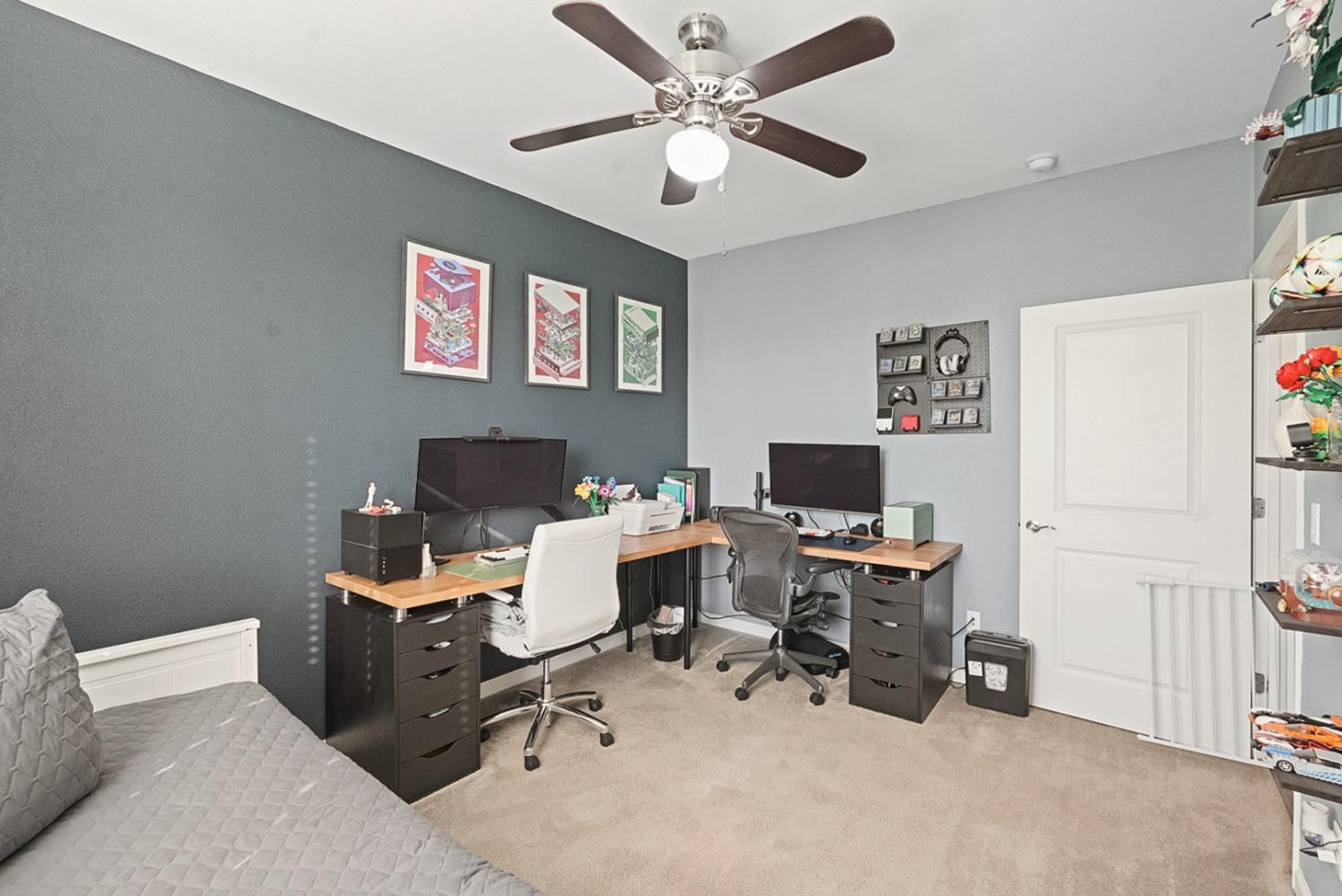 140 Ivy Avenue, Unit A5 Patterson, CA 95363 - Photo 13 of 26 a view of a workspace with furniture and a window
