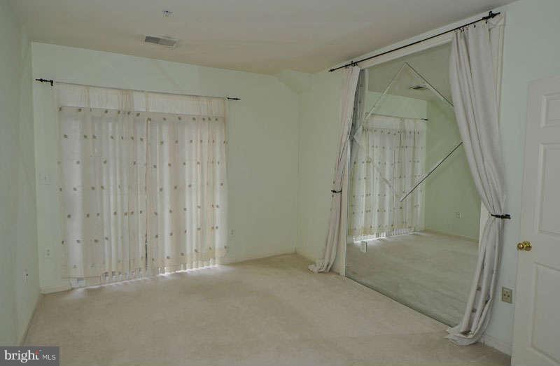 11408 Gate Hill Place, Unit O Reston, VA 20194 - Photo 13 of 30 a bathroom with a glass shower door