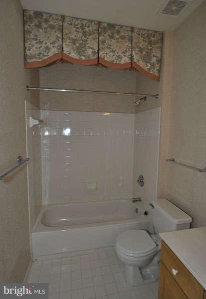 11408 Gate Hill Place, Unit O Reston, VA 20194 - Photo 16 of 30 a bathroom with a toilet and a shower