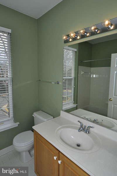 11408 Gate Hill Place, Unit O Reston, VA 20194 - Photo 19 of 30 a bathroom with a sink and toilet