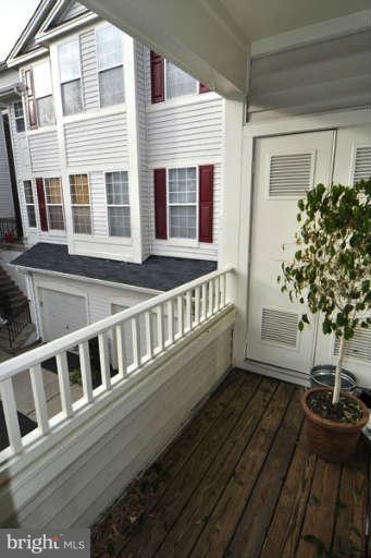11408 Gate Hill Place, Unit O Reston, VA 20194 - Photo 22 of 30 a view of a house with a balcony