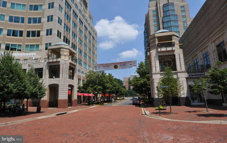 11408 Gate Hill Place, Unit O Reston, VA 20194 - Photo 25 of 30 a view of a building with a street