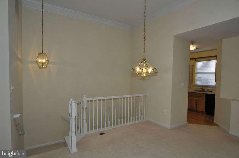 11408 Gate Hill Place, Unit O Reston, VA 20194 - Photo 4 of 30 a view of a chandelier and a chandelier in a room