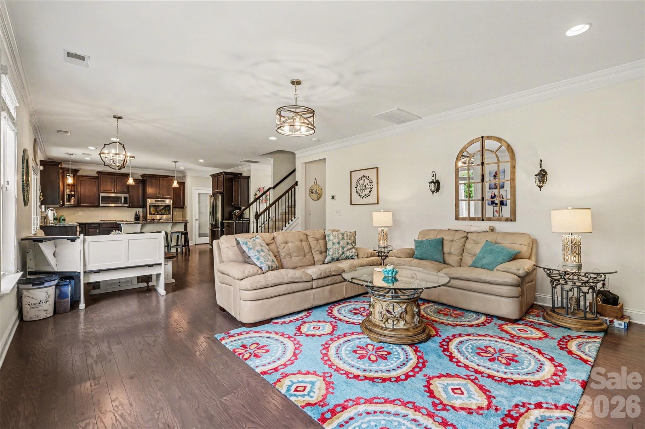 850 Coralbell Way Fort Mill, SC 29708 - Photo 14 of 48 a living room with furniture and wooden floor