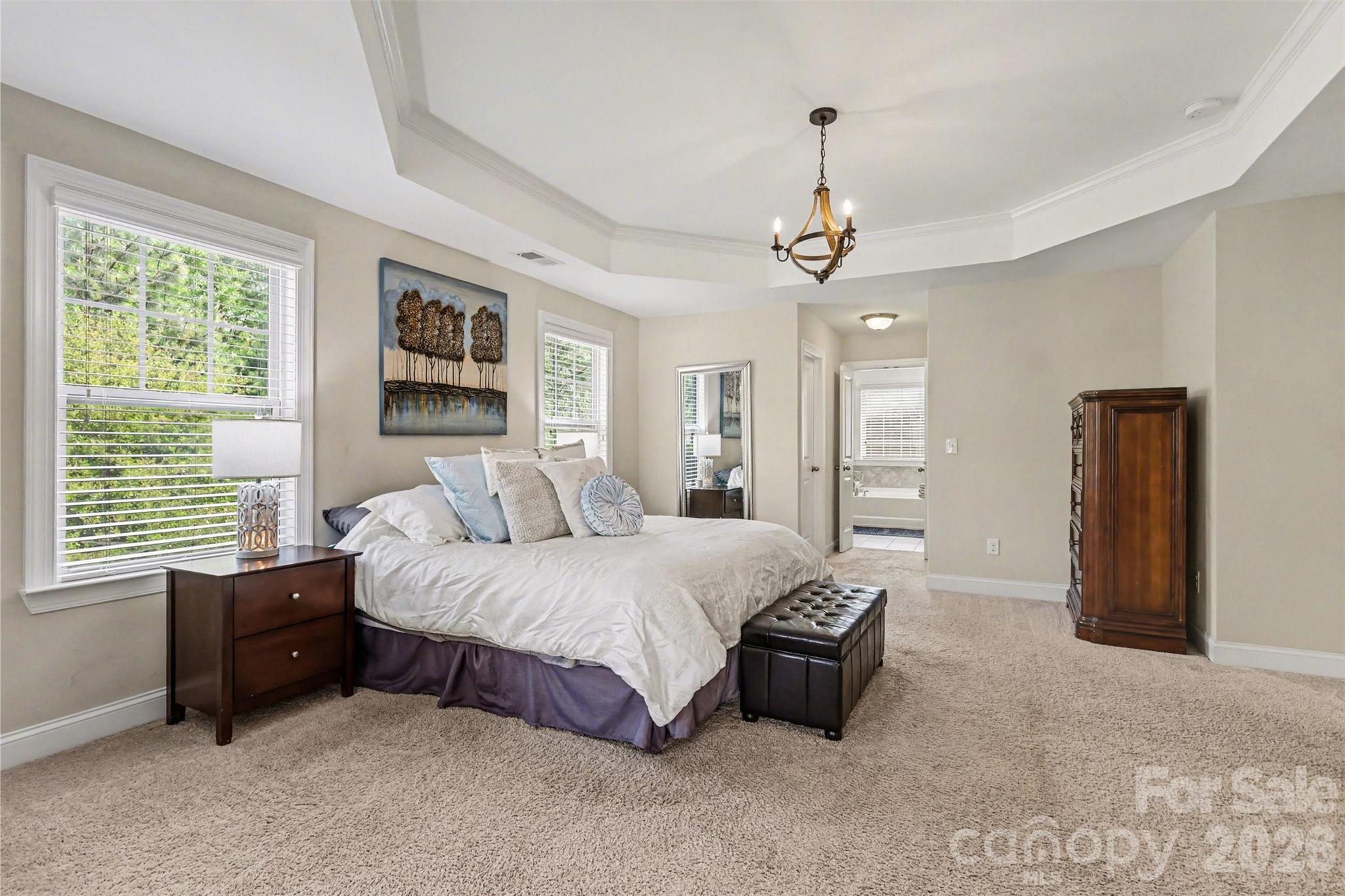 850 Coralbell Way Fort Mill, SC 29708 - Photo 24 of 48 a spacious bedroom with a bed and a window