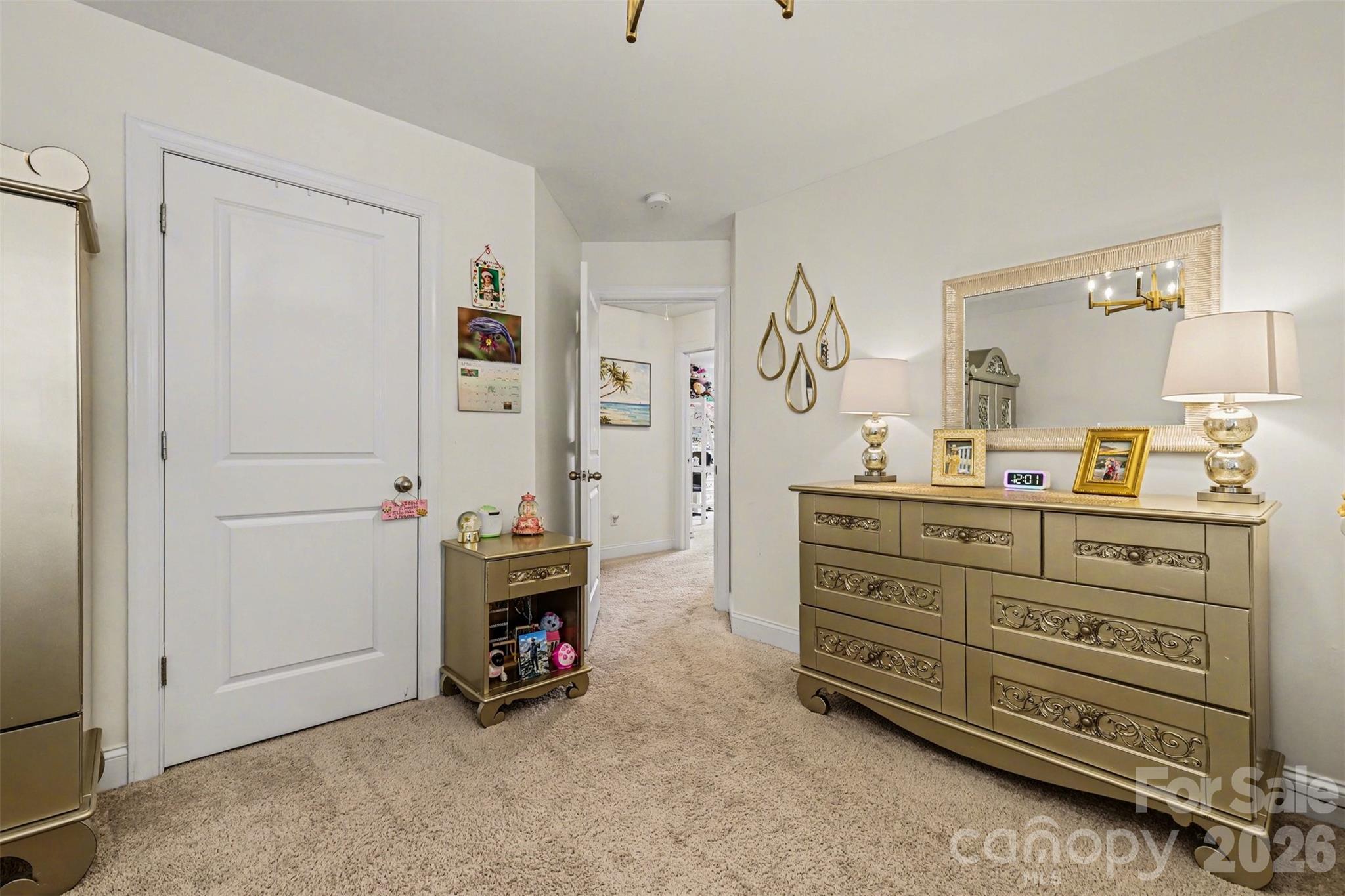 850 Coralbell Way Fort Mill, SC 29708 - Photo 28 of 48 a bed room with a bed and a mirror