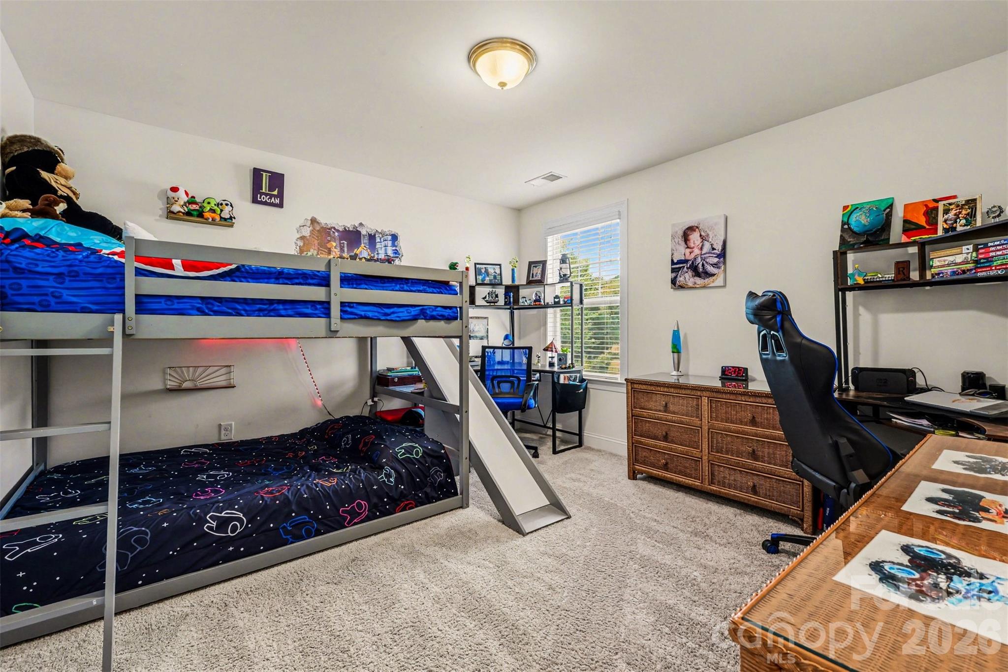 850 Coralbell Way Fort Mill, SC 29708 - Photo 30 of 48 a bedroom with furniture and a window