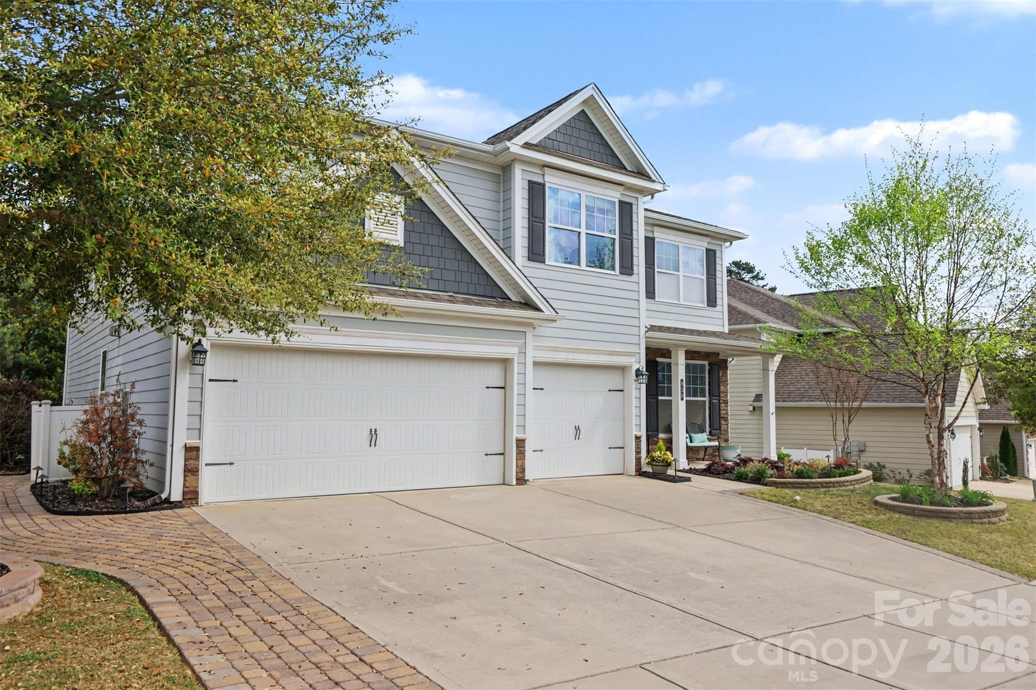 850 Coralbell Way Fort Mill, SC 29708 - Photo 3 of 44 a front view of a house with a yard
