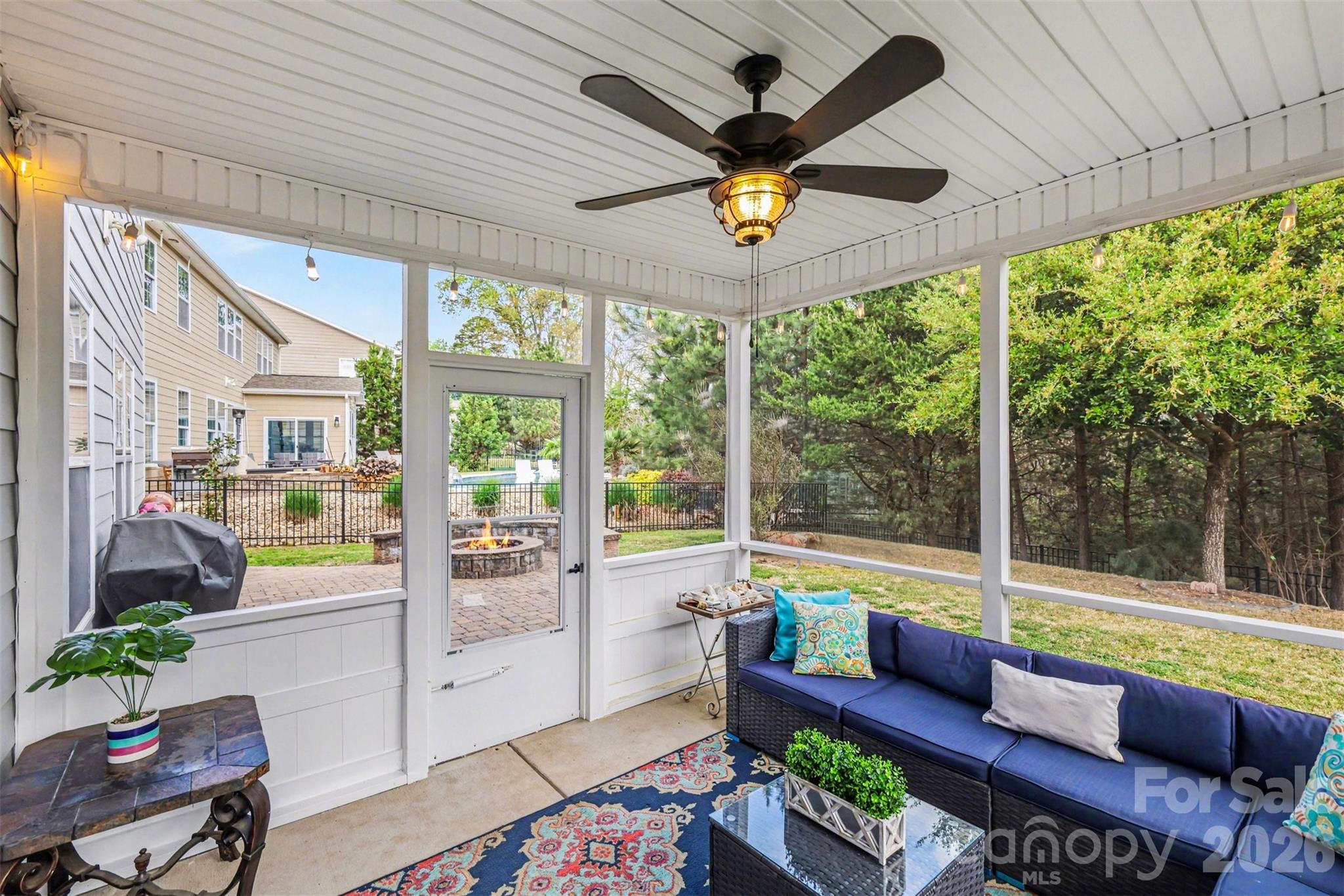 850 Coralbell Way Fort Mill, SC 29708 - Photo 34 of 48 a living room with furniture and a large window