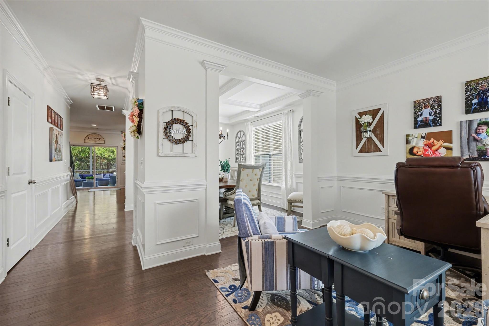 850 Coralbell Way Fort Mill, SC 29708 - Photo 5 of 48 a view of a dining room with furniture and wooden floor
