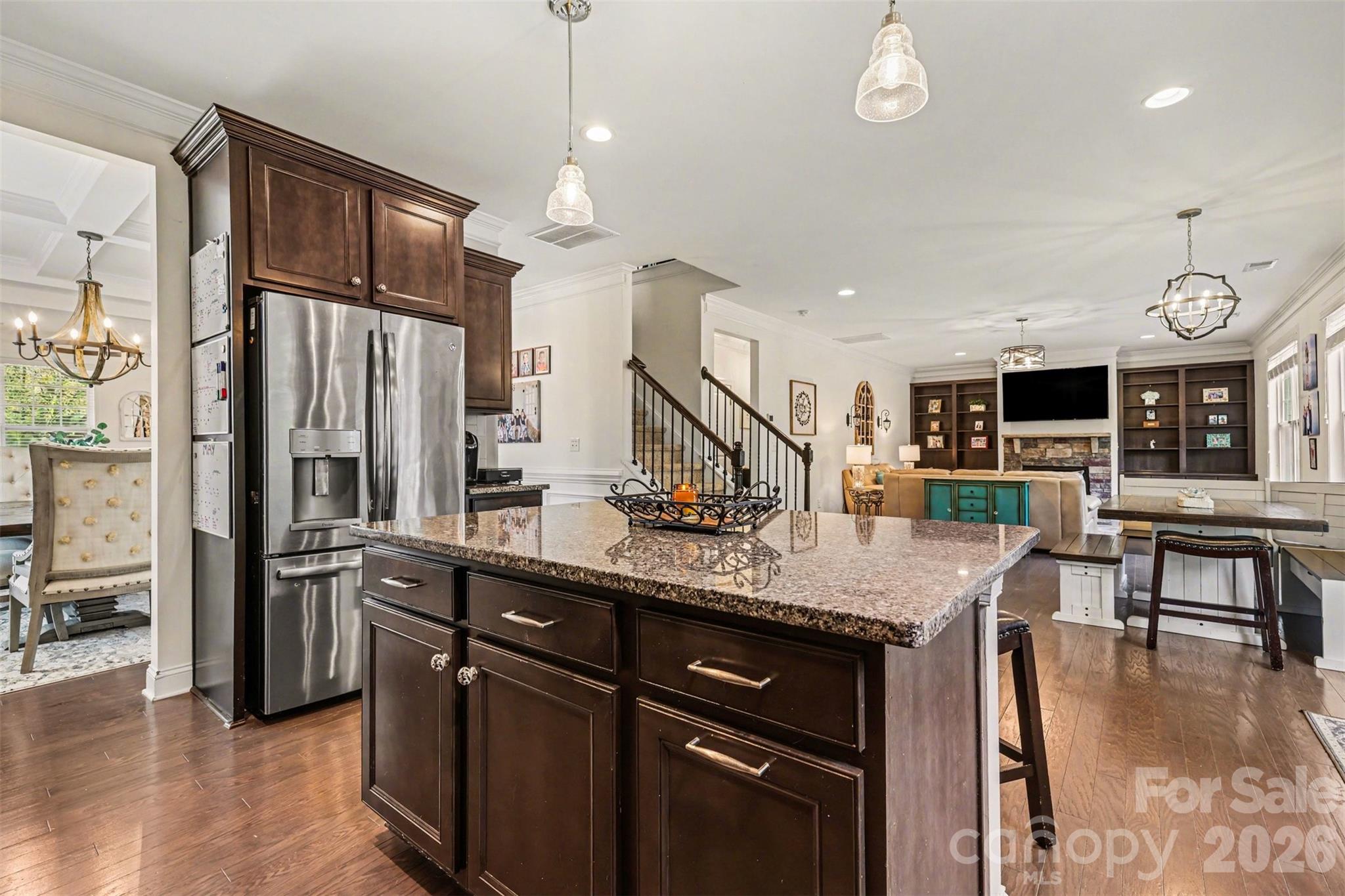 850 Coralbell Way Fort Mill, SC 29708 - Photo 10 of 48 a kitchen with stainless steel appliances granite countertop a stove refrigerator and cabinets
