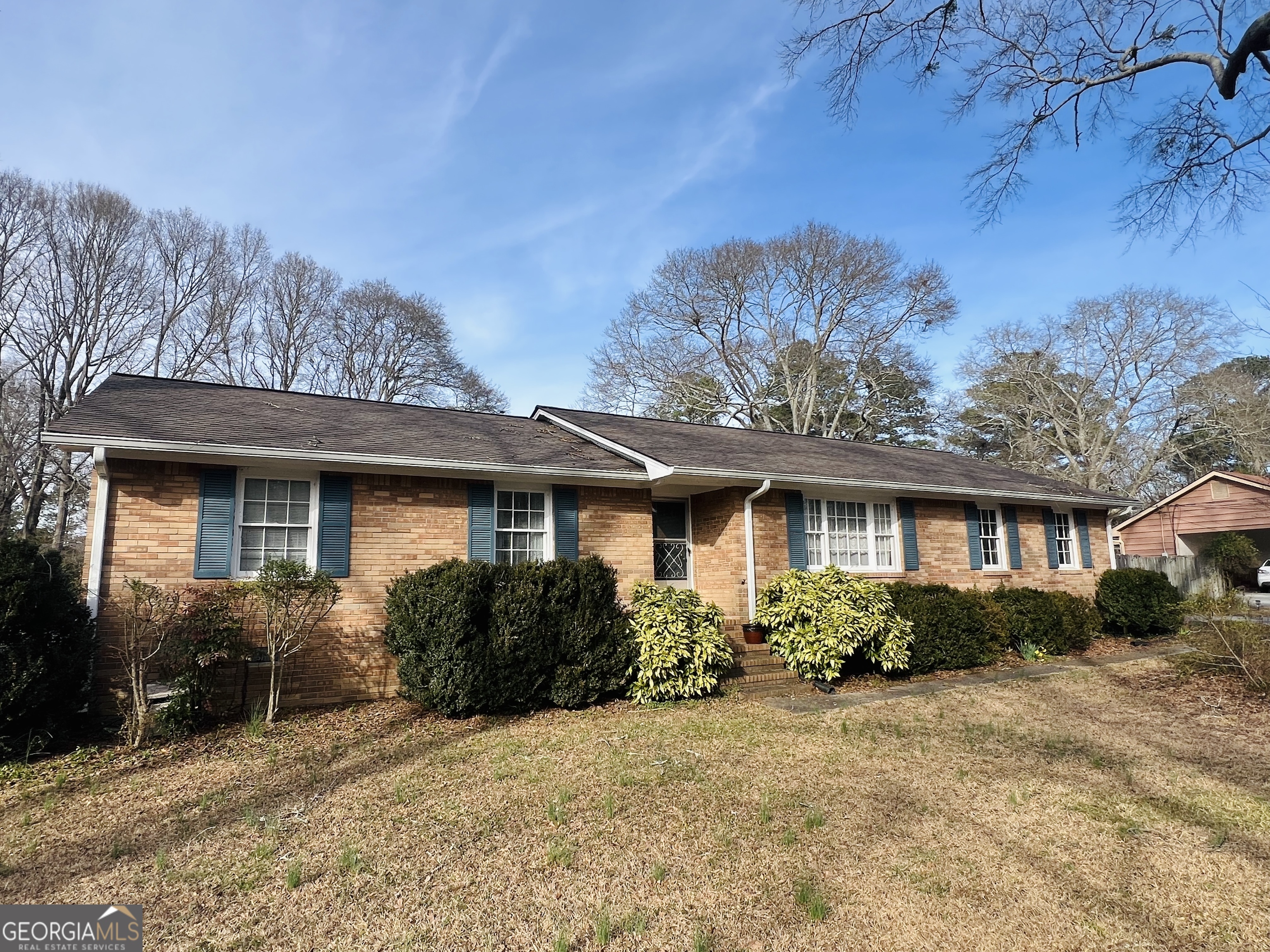 211 Clark Road Griffin, GA 30224 - Photo 1 of 25 a front view of a house with garden