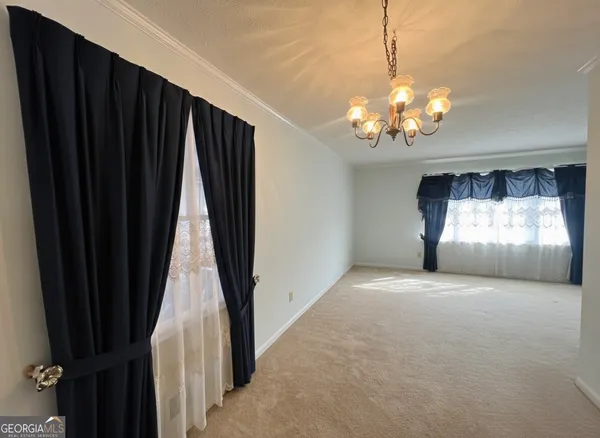 a view of a livingroom with a chandelier