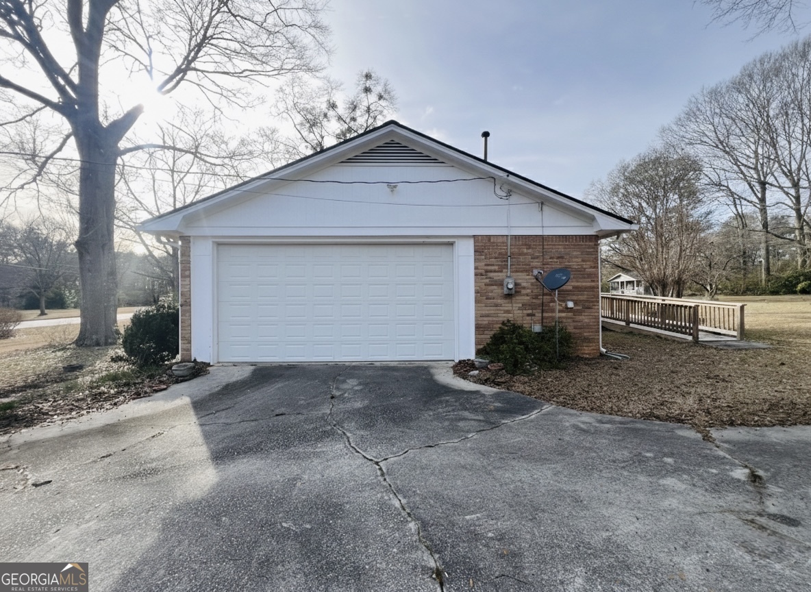 211 Clark Road Griffin, GA 30224 - Photo 20 of 25 a view of a house with a yard
