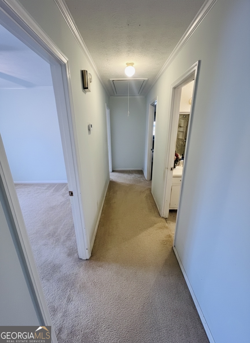 211 Clark Road Griffin, GA 30224 - Photo 23 of 25 a view of a hallway to rooms