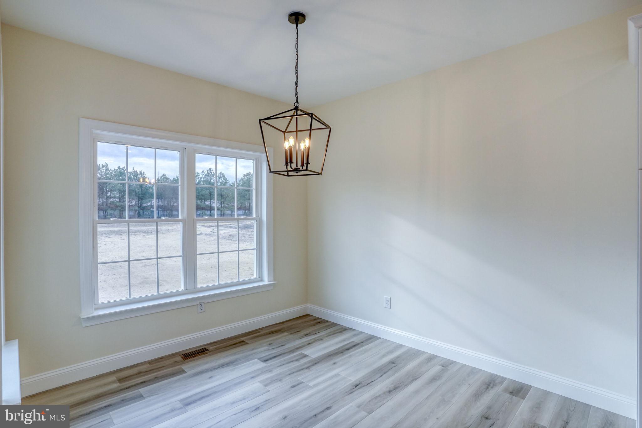 3150 Old Sharptown Road Laurel, DE 19956 - Photo 26 of 46 a view of an empty room with windows