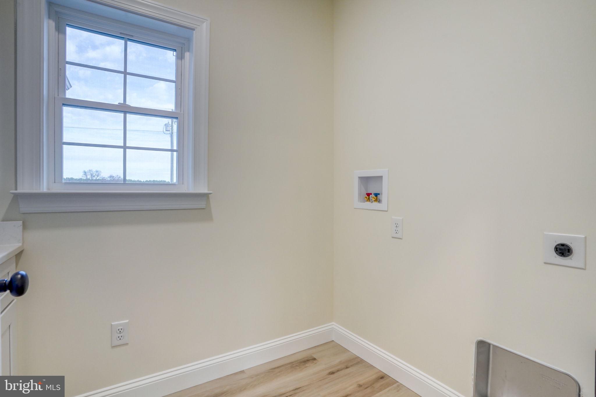 3150 Old Sharptown Road Laurel, DE 19956 - Photo 31 of 46 an empty room with a window